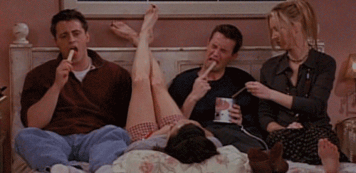 a gif from FRIENDS, featuring Joey, Chandler and Phoebe, all pretending to eat leg waxing wax